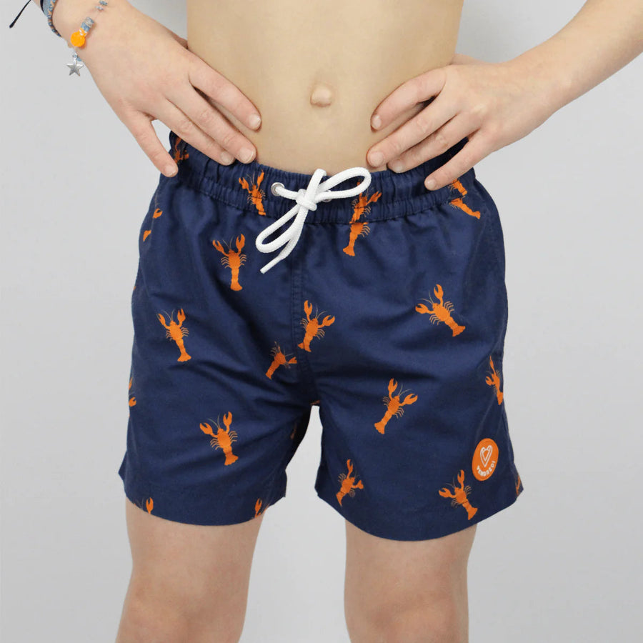 Short-de-bain-enfant-bleu-marine-motif-homard-face